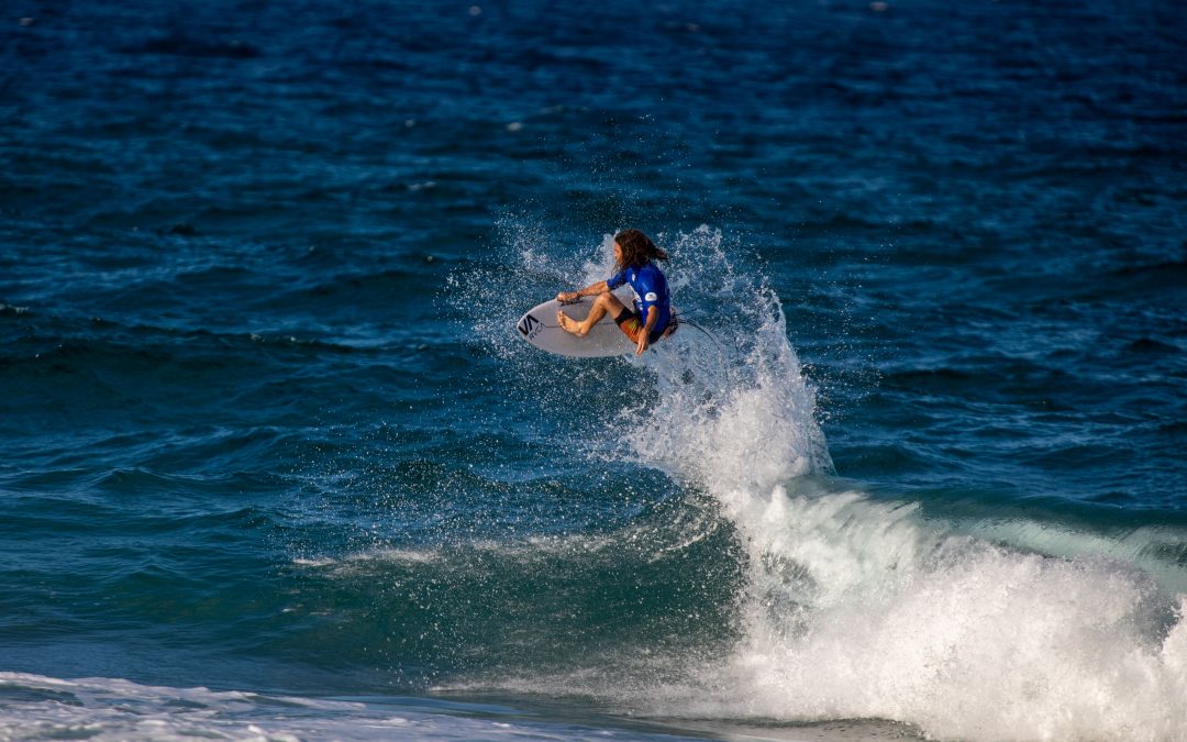 Aaron Kelly takes flight and Dimity Stoyle grooves her way to victory at the Gold Coast Pro